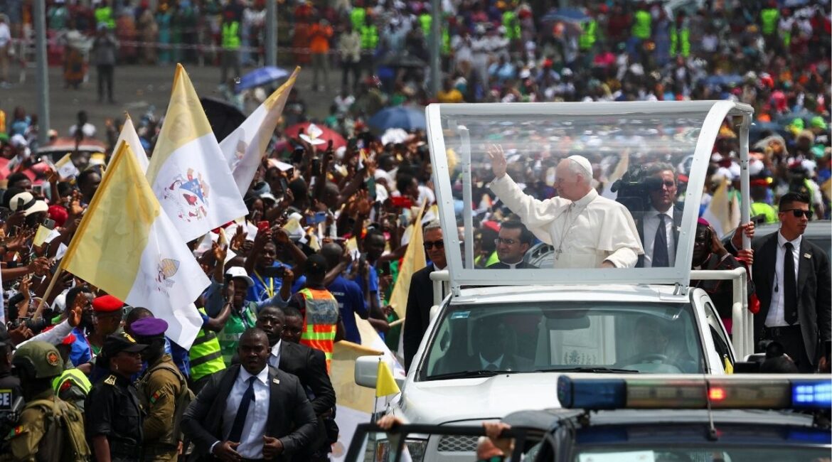 Pope Leo XIV greets people as he arrives to hold a holy Mass near Japoma Stadium in Douala, Cameroon, April 17, 2026. (Reuters/Guglielmo Mangiapane)