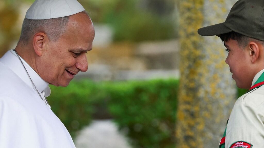 Pope Leo XIV reacts as he speaks with the youth who helped him plant a tree during his visit to the archaeological site of Hippo Regius in Annaba, Algeria, April 14, 2026. (Reuters/Guglielmo Mangiapane)
