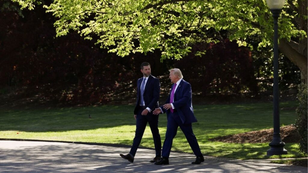 President Donald Trump speaks to Eric Trump as they walk together to depart the White House in Washington, D.C., U.S., April 10, 2026. (Reuters/Anna Rose Layden)