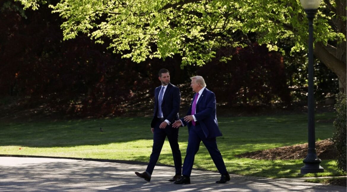 President Donald Trump speaks to Eric Trump as they walk together to depart the White House in Washington, D.C., U.S., April 10, 2026. (Reuters/Anna Rose Layden)