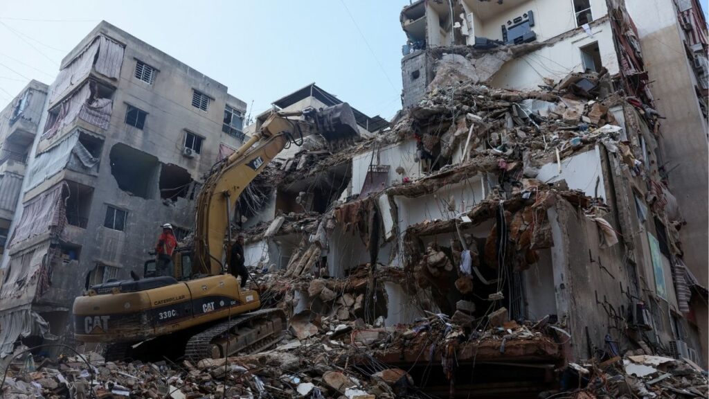 Rescuers assisted by heavy machinery work at the site of an Israeli strike carried out on Wednesday, in the southern suburbs of Beirut, Lebanon, April 10, 2026. (Reuters/Mohamed Azakir)