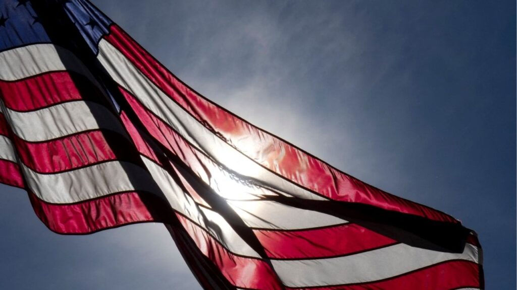 Sep 12, 2024; Gainesville, Virginia, USA; An American flag ripples on display at Robert Trent Jones Golf Club. Mandatory Credit: Aaron Doster-Imagn Images