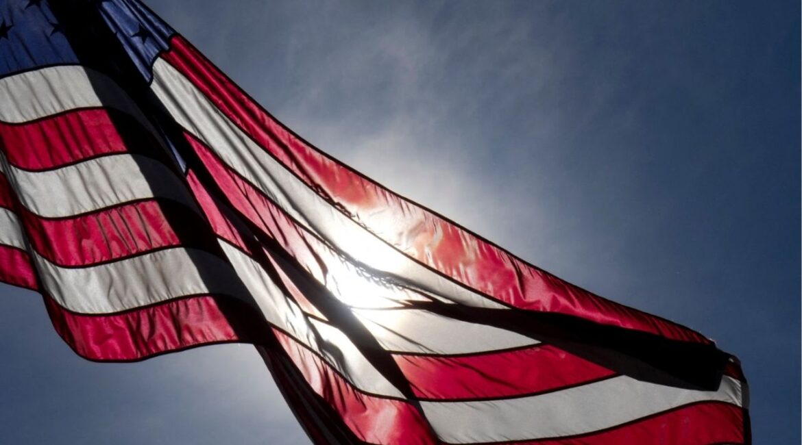 Sep 12, 2024; Gainesville, Virginia, USA; An American flag ripples on display at Robert Trent Jones Golf Club. Mandatory Credit: Aaron Doster-Imagn Images