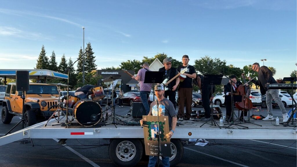 Stephen Quick speaks to the crowd attending the one-year anniversary of his son's, Caleb Quick, murder on Thursday, April 23, 2026. (GV Wire/Anthony W. Haddad)
