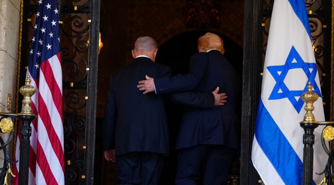 Image of the Benjamin Netanyahu and Donald Trump exiting a room with their arms around each other's back