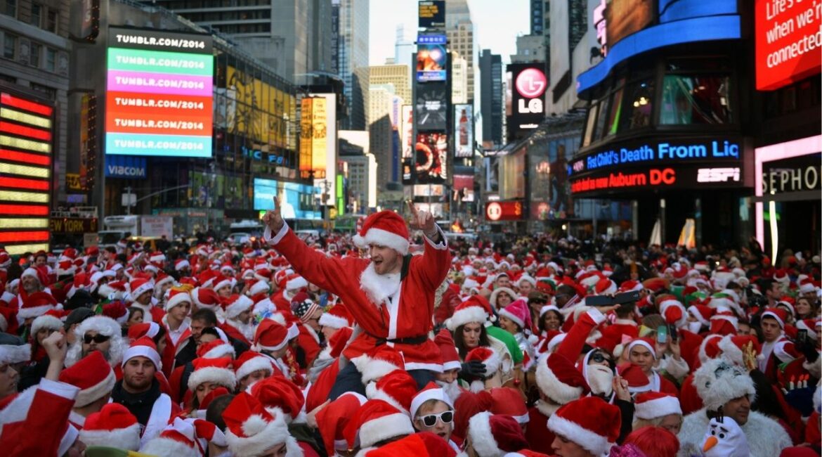 The annual SantaCon pub crawl gathers in Times Square, in New York, Dec. 13, 2014. The lead organizer of SantaCon NYC, an annual Christmas-themed bar crawl that is both beloved and reviled, took more than half of the nearly $3 million the event raised for charity over five years, federal prosecutors said on Wednesday, April 15, 2026. (C.S. Muncy/The New York Times)