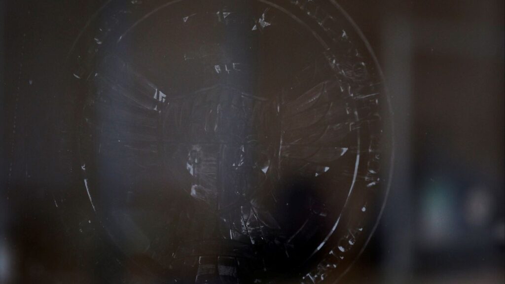 The name and logo for the Consumer Financial Protection Bureau (CPFB) is seen scraped off the door of its building in Washington, D.C., U.S., February 20, 2025. (Reuters/Brian Snyder)