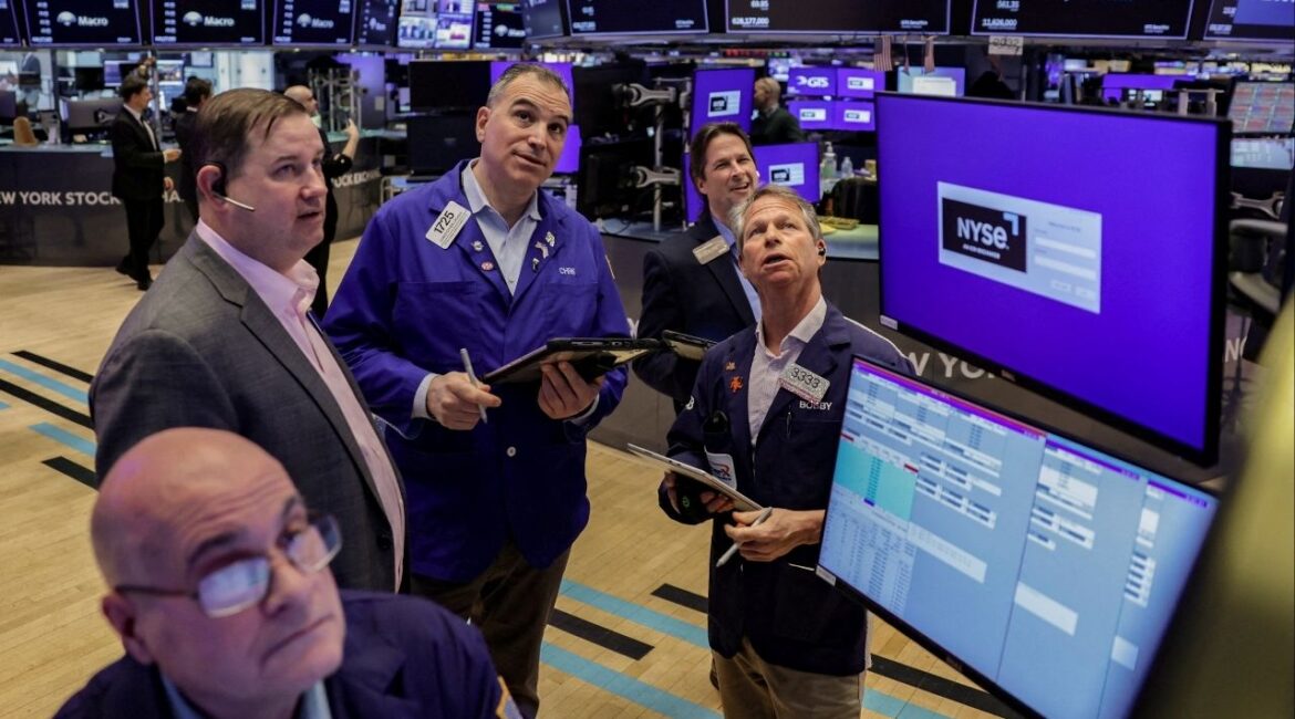 Traders work on the floor at the New York Stock Exchange (NYSE) in New York City, U.S., March 24, 2026. (Reuters File)