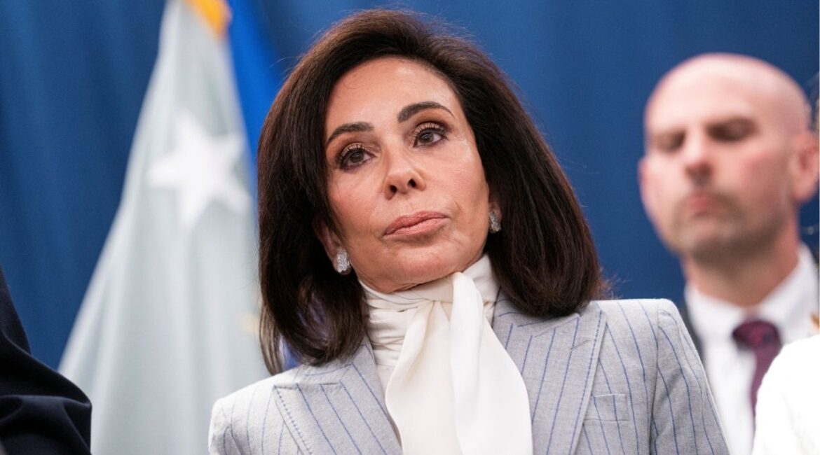 U.S. Attorney for the District of Columbia Jeanine Pirro looks on while announcing charges in connection with an international car theft ring during a press conference at the Justice Department in Washington, D.C., U.S., April 22, 2026. (Reuters/Nathan Howard)
