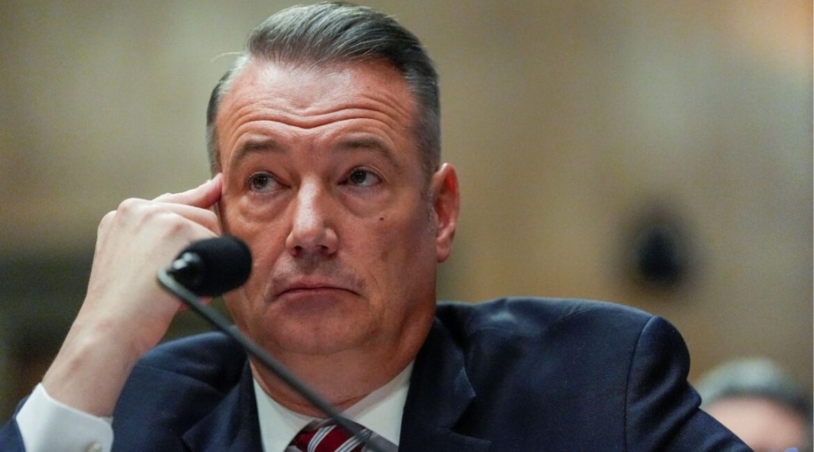 U.S. Immigration and Customs Enforcement (ICE) Acting Director Todd Lyons attends a Senate Homeland Security and Government Affairs Committee hearing on Capitol Hill in Washington, D.C., U.S., February 12, 2026. REUTERS/Kent Nishimura