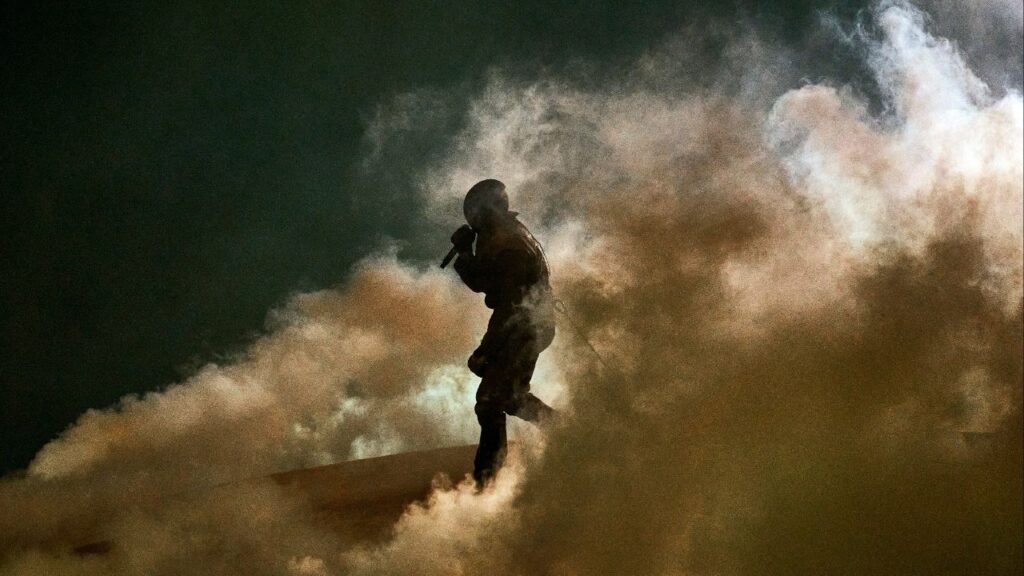 Ye, the rapper formerly known as Kanye West, performs on Wednesday night, April 1, 2026, at SoFi Stadium in Inglewood, Calif. For Ye and his devotees, the concert was perhaps the first high-profile moment of a dedicated rebranding as the artist, producer and fashion designer tries to repair his image. (Philip Cheung/The New York Times)