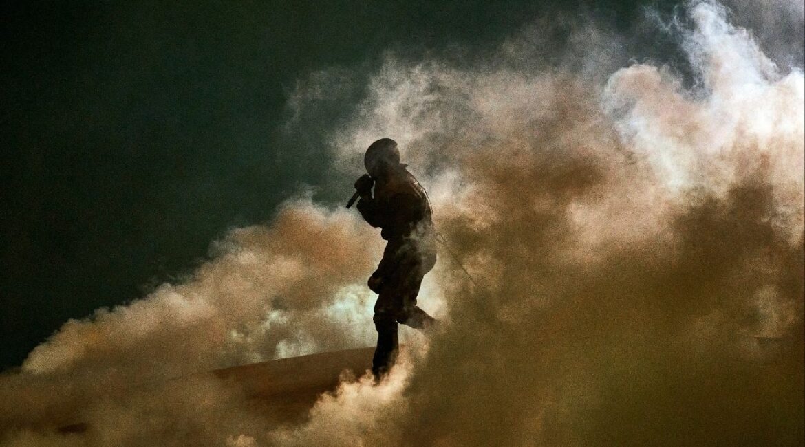 Ye, the rapper formerly known as Kanye West, performs on Wednesday night, April 1, 2026, at SoFi Stadium in Inglewood, Calif. For Ye and his devotees, the concert was perhaps the first high-profile moment of a dedicated rebranding as the artist, producer and fashion designer tries to repair his image. (Philip Cheung/The New York Times)