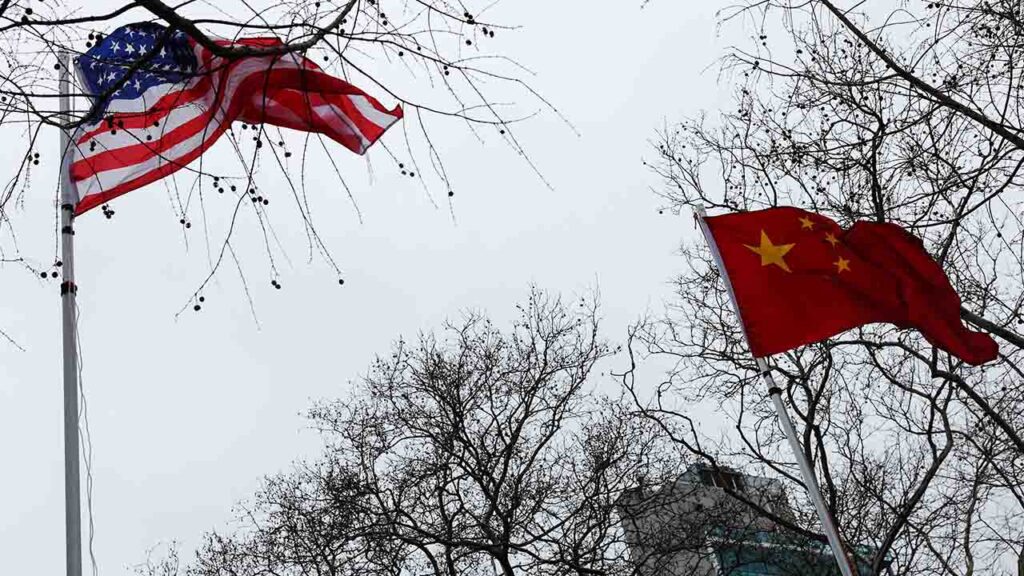 The flags of the United States and China wave in the wind in New York City, U.S., February 17, 2026. (Reuters/File Photo)