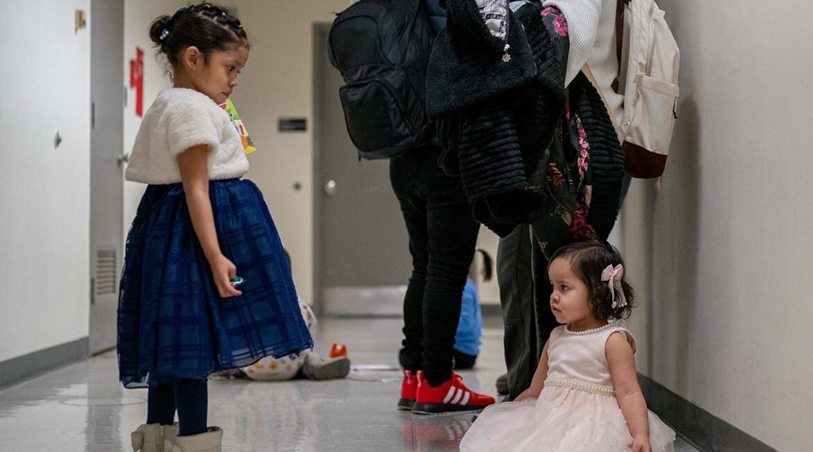 Children play as their guardians wait to be check into court hearings at U.S. immigration court in Manhattan, in New York City, U.S., January 13, 2026. (Reuters/David 'Dee' Delgado)