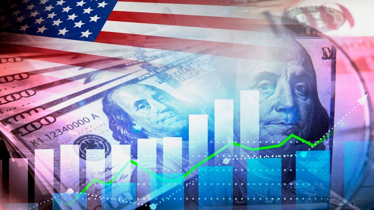 Composite red white and blue image of $100 bill and graphy bars symbolizing inflation