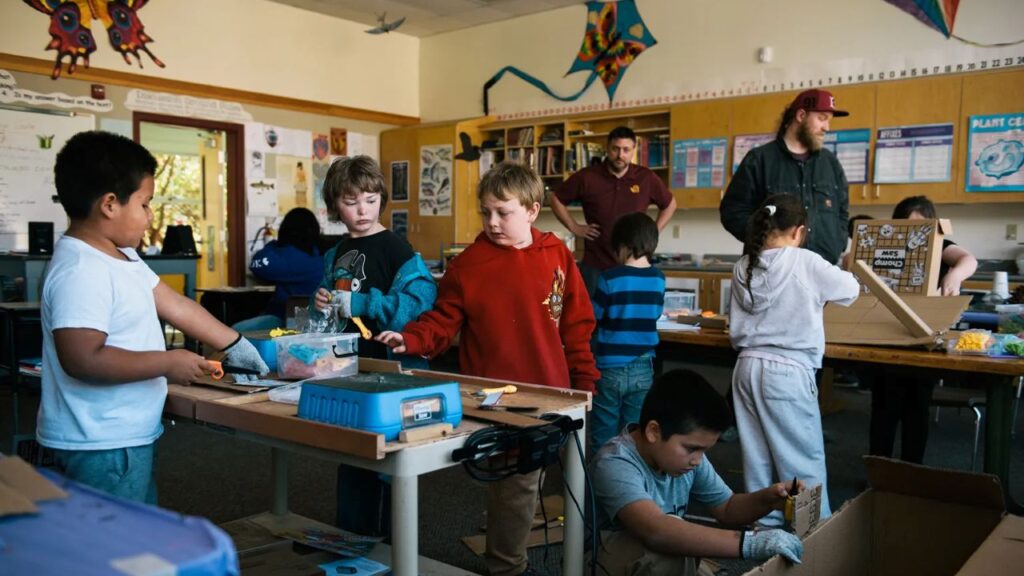 Image of teachers and students in a busy classroom in Orick, California