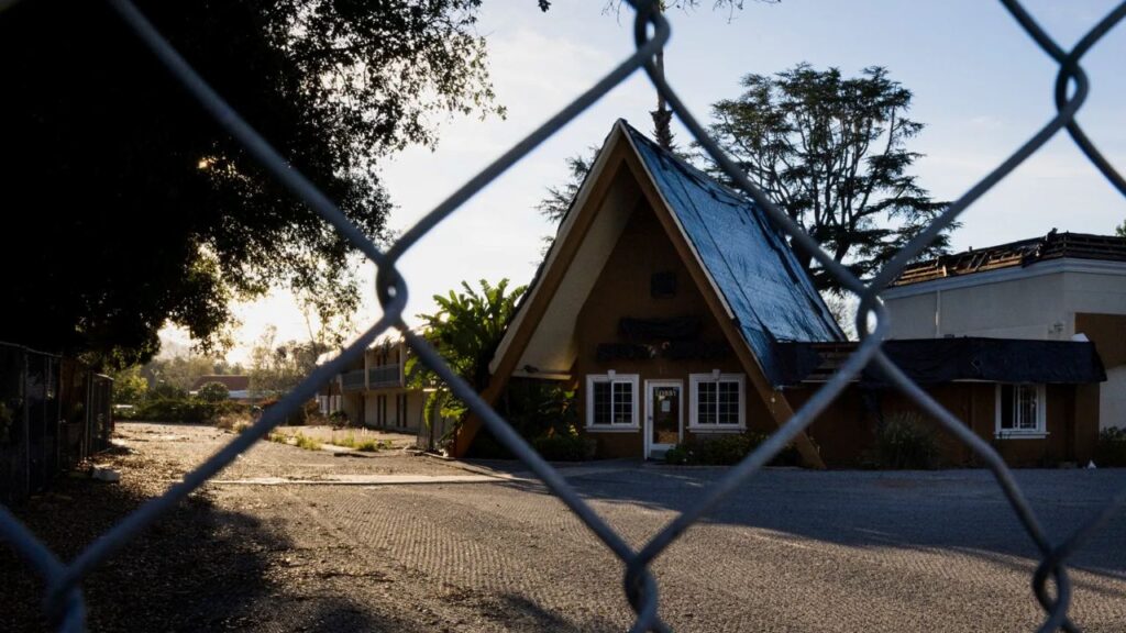 Image of a former Quality Inn motel converted to housing for the homeless