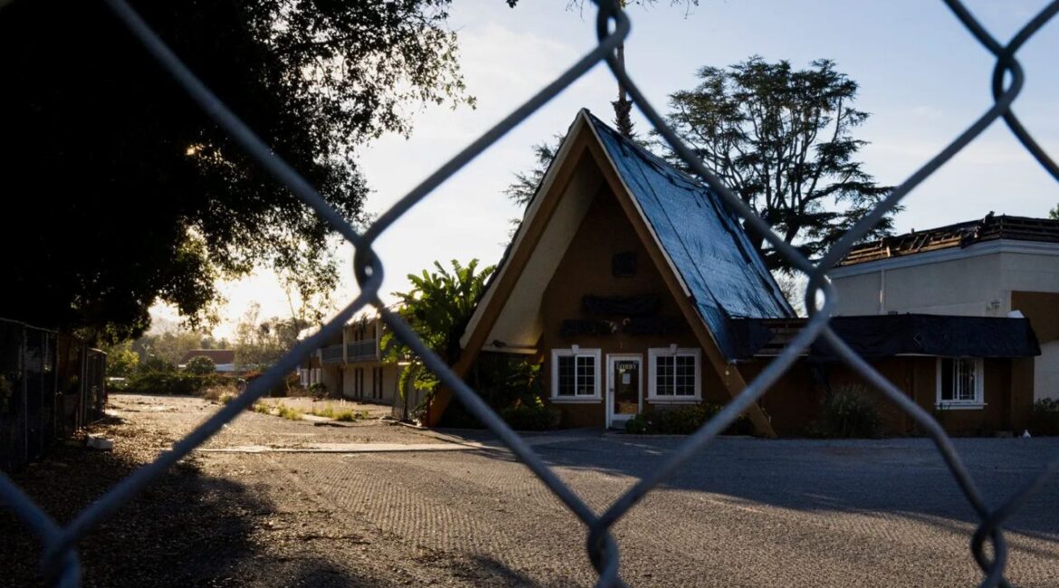 Image of a former Quality Inn motel converted to housing for the homeless