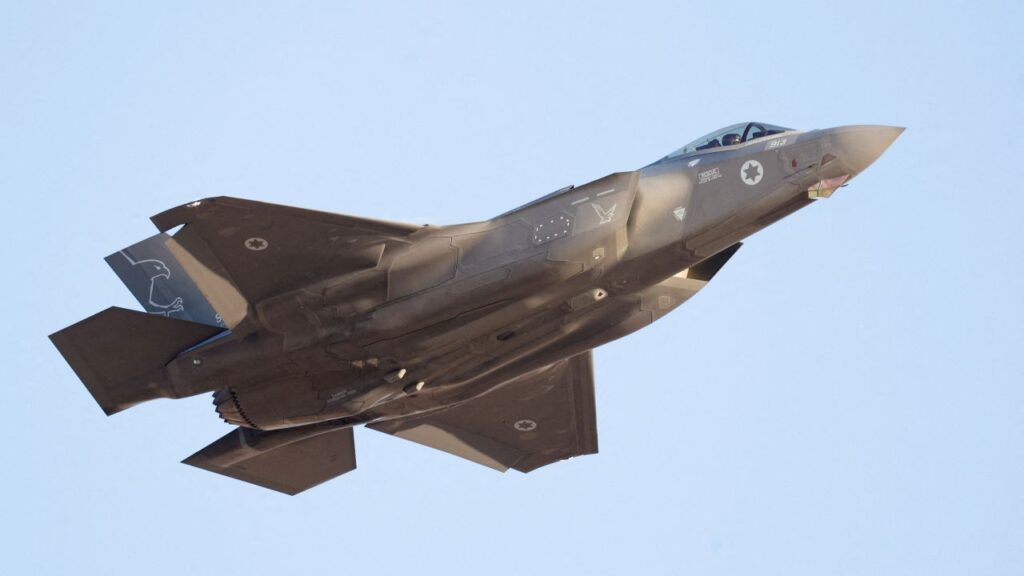 Image of an Israeli F-35 fighter jet soaring through the air amid blue skies