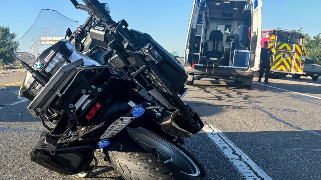 A CHP motorcycle officer suffered serious injuries Thursday, May 7, 2026, after being struck from behind while helping a disabled vehicle on Highway 99 in Fresno, but authorities said he has since been released from the hospital and is recovering at home. (CHP)