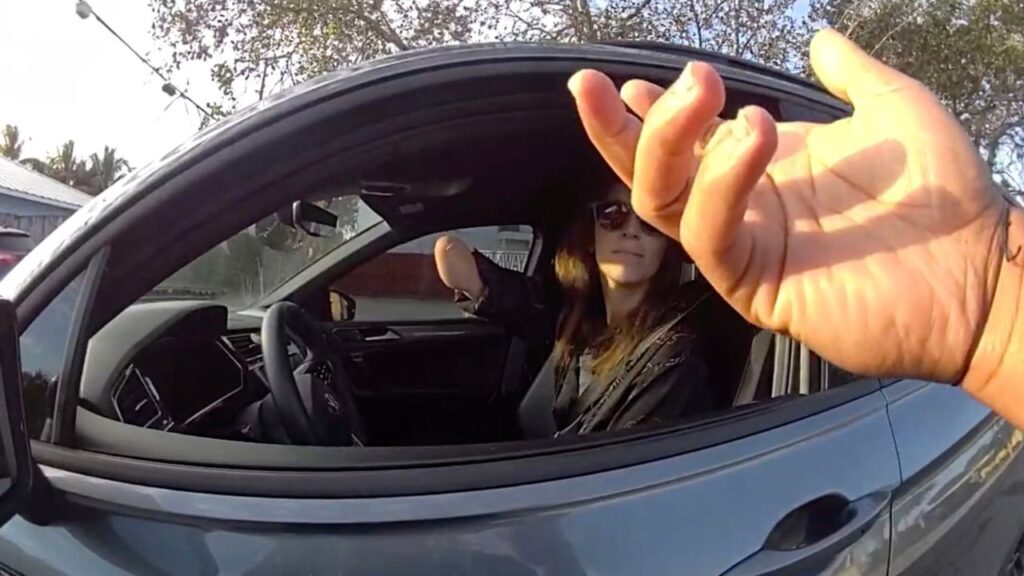 A still image provided by Palm Beach County Sheriff's Office shows Kathleen Thomas raise her right arm from an officer’s body-cam footage. The Palm Beach County Sheriff’s Office said on Thursday that it was reviewing a deputy’s conduct after video of a traffic stop was shared widely online. (Palm Beach County Sheriff's Office via The New York Times)