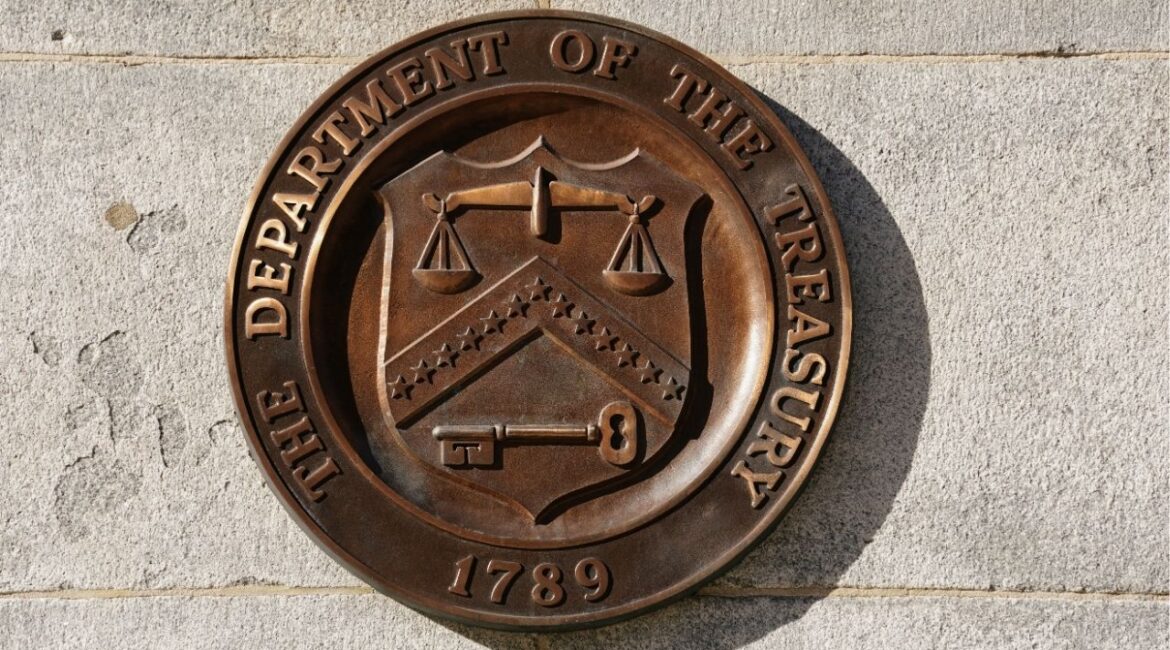 A bronze seal for the Department of the Treasury is shown at the U.S. Treasury building in Washington, U.S., January 20, 2023. (Reuters/Kevin Lamarque)