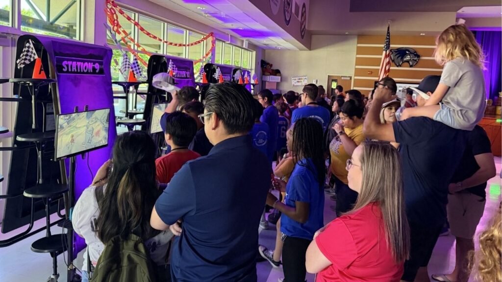 A crowd of students and coaches watch teams compete at the Clovis Unified School District's Mario Kart Tournament on Saturday, May 9, 2026. (GV Wire)