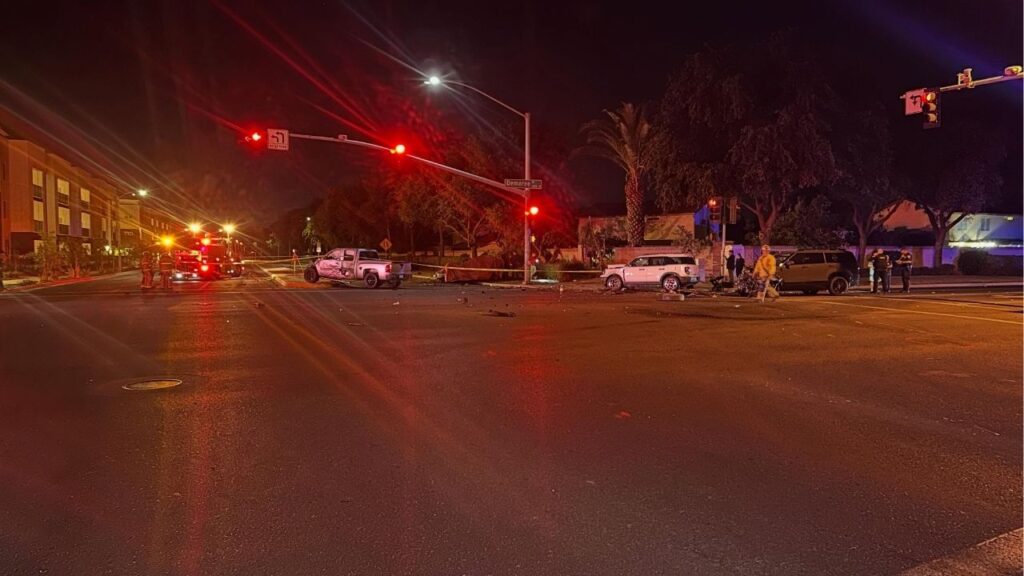 A driver died Wednesday night after a four-vehicle crash sparked a vehicle fire on Demaree Street in Visalia, prompting road closures and a police investigation. (Visalia PD)