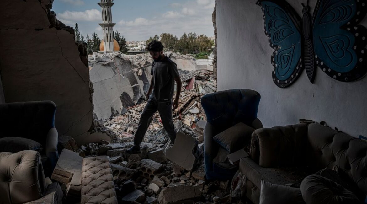 A family member assess the damage to a destroyed apartment in an apartment building in the aftermath of an Israeli airstrike in the Burj al-Shemali village near Tyre, Lebanon, on Tuesday, May 26, 2026. Israel intensified its military campaign against Hezbollah on Tuesday, striking targets across Lebanon after Prime Minister Benjamin Netanyahu said he had ordered the military to “increase the blows” against the Iran-backed militant group. (Daniel Berehulak/The New York Times)