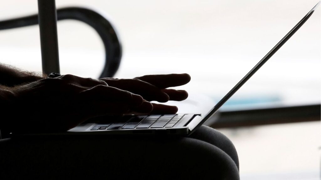 A man works with a laptop at the airport in Hanoi, Vietnam October 18, 2017. (Reuters File)
