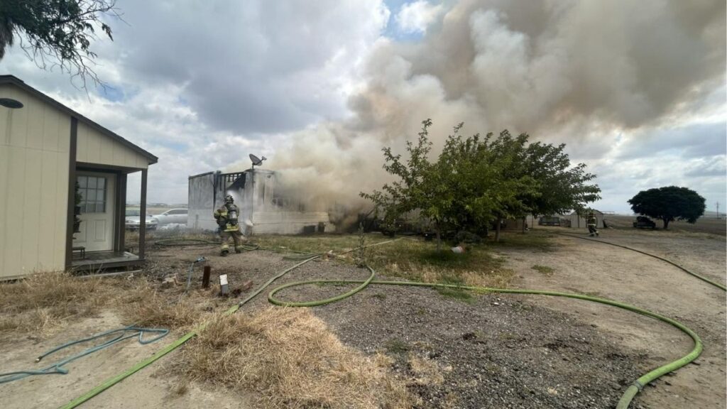 A mobile home was heavily damaged in a fire near Road 80 and Avenue 364 in Tulare County with no injuries reported and the cause under investigation. (Tulare County FD)