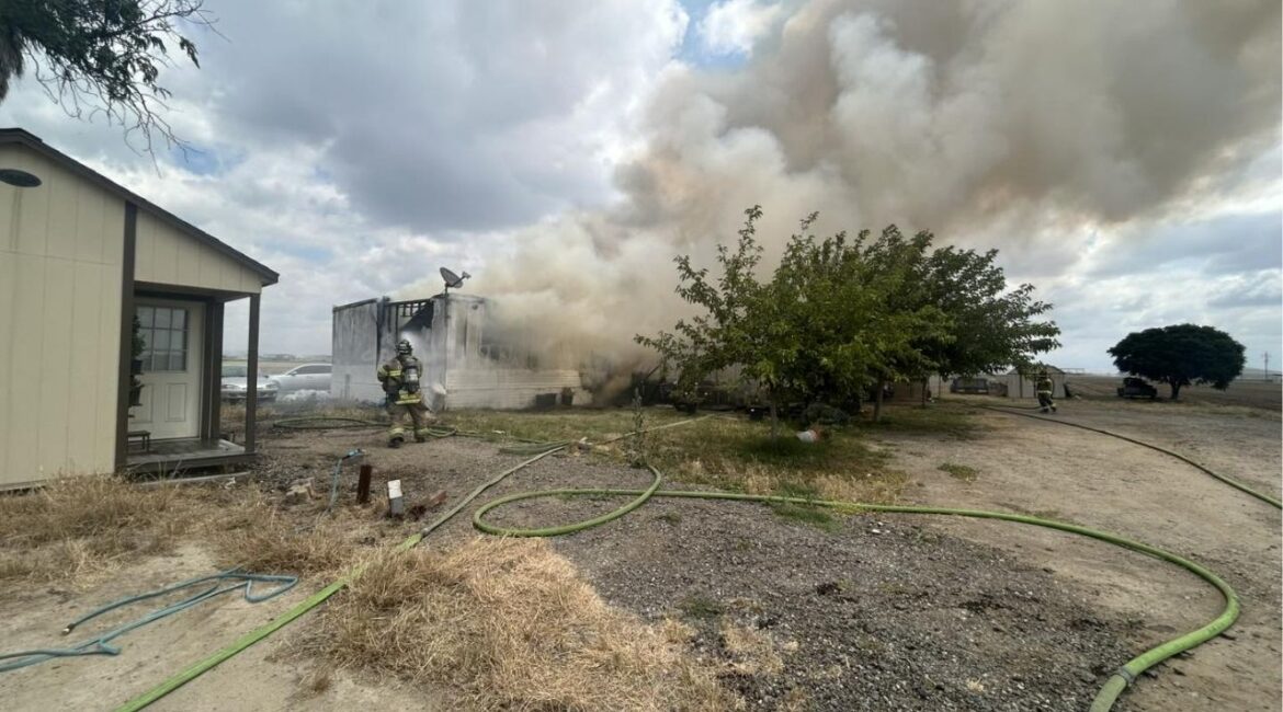 A mobile home was heavily damaged in a fire near Road 80 and Avenue 364 in Tulare County with no injuries reported and the cause under investigation. (Tulare County FD)