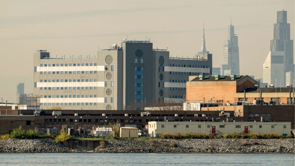 A view of Rikers Island and the Manhattan skyline in New York, Nov. 3, 2025. A 40-year-old man died at the Rikers Island jail complex on Tuesday, May 19, 2026, officials said. It was the second death at the troubled facility in 24 hours and the fourth in New York City Department of Correction custody this year. (Karsten Moran/The New York Times)