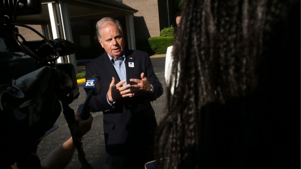 Former Sen. Doug Jones (D-Ala.), the heavy favorite to prevail in the Democratic primary for governor, speaks to reporters after casting his primary ballot in Birmingham, Ala., on Tuesday morning, May 19, 2026. (Bob Miller/The New York Times)