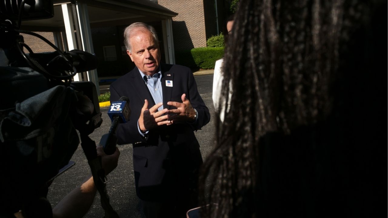 Former Sen. Doug Jones (D-Ala.), the heavy favorite to prevail in the Democratic primary for governor, speaks to reporters after casting his primary ballot in Birmingham, Ala., on Tuesday morning, May 19, 2026. (Bob Miller/The New York Times)