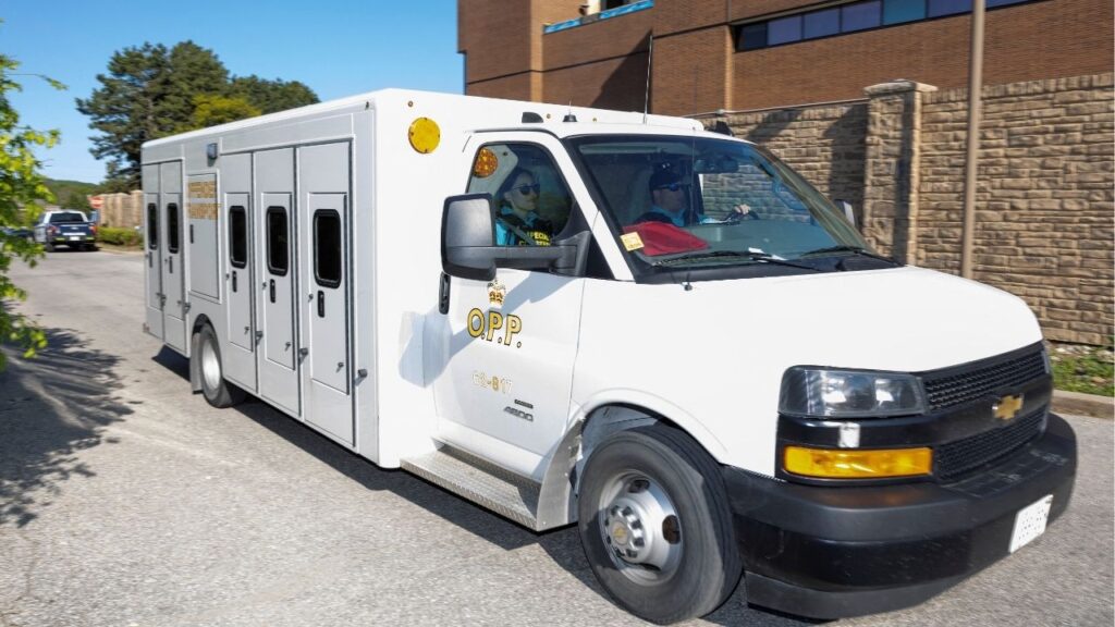 An Ontario Provincial Police offender transport vehicle arrives at the Superior Court of Justice, on the day when Kenneth Law, accused of selling lethal substances to people who later took their own lives, is expected to plead guilty to 14 counts of aiding suicide, in Newmarket, Ontario, Canada May 29, 2026. (Reuters/Carlos Osorio)