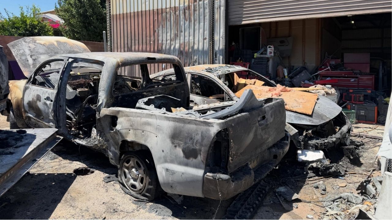 An early Tuesday fire destroyed three vehicles outside a Fresno auto body shop, but firefighters prevented major damage to the business, officials said. (Fresno FD)