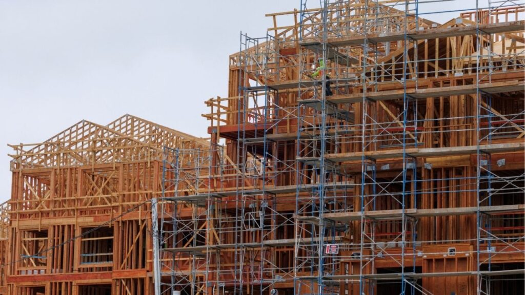 Construction crew members work on a multi-unit residential housing building in Encinitas, California, U.S., October 6, 2025. (Reuters File)
