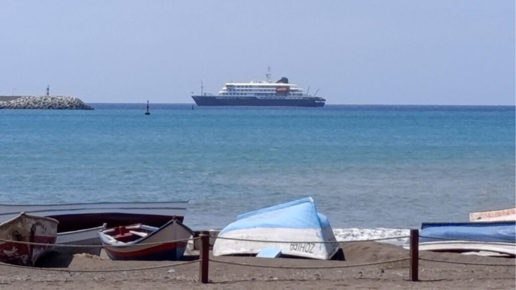 Cruise ship MV Hondius docks off Cape Verde port, as passengers were not allowed off the ship, while health authorities investigated suspected cases of hantavirus aboard the vessel, in Praia Port, Cape Verde, May 4, 2026. (Reuters/Stringer)