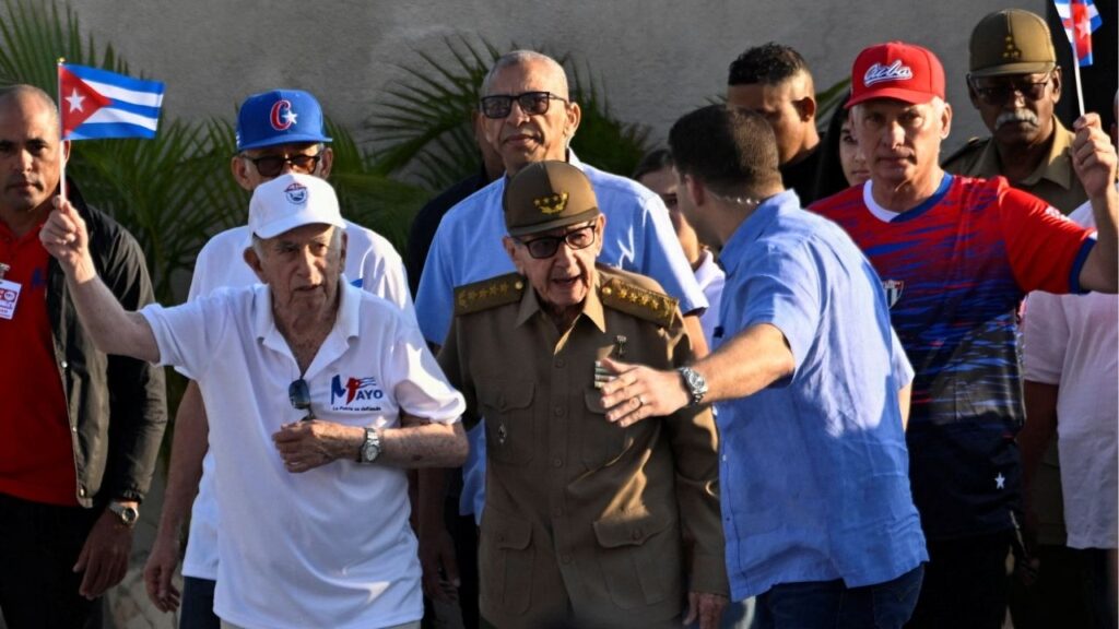 Cuba's former President Raul Castro and Cuba's President Miguel Diaz-Canel arrive for a May Day rally as Raul Castro's grandson Raul Guillermo Rodriguez Castro, known as "El Cangrejo" and chief of Raul Castro’s security, gestures, in Havana, Cuba, May 1, 2026. REUTERS/Norlys Perez