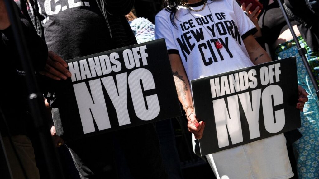 Demonstrators hold signs during an anti-ICE protest in front of 26 Federal Plaza Immigration Court in the Manhattan borough of New York City, U.S. May 12, 2026. (Reuters File)