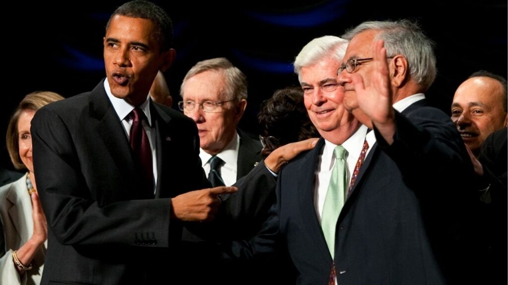 FILE — President Barack Obama gestures towards Sen. Christopher Dodd (D-Conn.), center, and Rep. Barney Frank (D-Mass.), right, after he signed the Dodd-Frank Wall Street Reform and Consumer Protection Act at the Ronald Reagan Building in Washington, July 21, 2010. Frank, the brassy, lightning-quick former Massachusetts representative who for decades was the most prominent gay politician in the country and who was an author of the most significant overhaul of the nation’s financial regulations since the Great Depression, died on Tuesday, May 19, 2026, at his home in Ogunquit, Maine. He was 86. (Doug Mills/The New York Times)