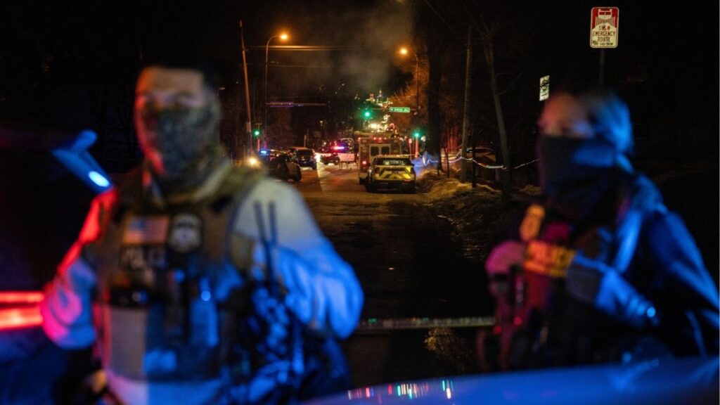 Federal agents near the scene where a federal agent shot a man from Venezuela while trying to detain him in Minneapolis, Jan. 14, 2026. Law enforcement officials from Minnesota and Texas on Friday, May 29, arrested Christian Castro, an Immigration and Customs Enforcement agent accused of shooting the Venezuelan immigrant this year and lying about it. (David Guttenfelder/The New York Times)