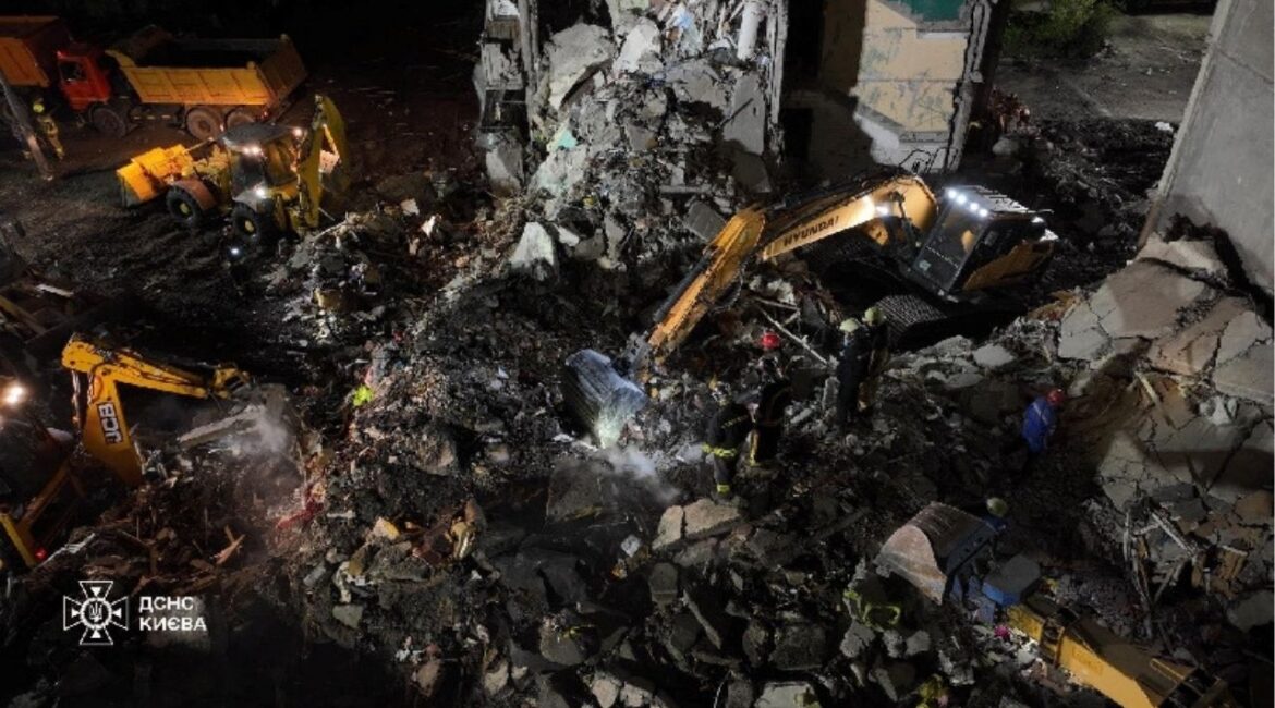 Firefighters work at a site of the apartment building damaged during yesterday's Russian missile and drone strike, amid Russia's attack on Ukraine, in Kyiv, Ukraine in this handout picture released May 15, 2026. Press service of the State Emergency Service of Ukraine in Kyiv/Handout via REUTERS