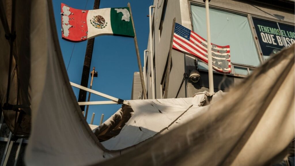 Flag signs at the U.S. border in Tijuana, Mexico, June 12, 2025. The Trump administration this week instructed federal prosecutors to use terrorism statutes to target Mexican officials complicit in the narcotics trade, according to a U.S. official familiar with the remarks. (Alejandro Cegarra/The New York Times)
