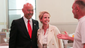 Former Clovis Unified Superintendent Dr. Eimear O’Brien laughs while speaking with Clovis Mayor Vong Mouanoutoua during the 2026 Mayor’s Breakfast in Clovis, California. (GV Wire/Eric Martinez)