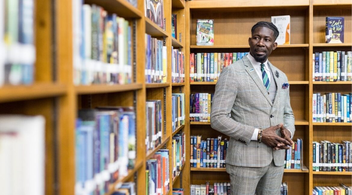 Ian Roberts visits a middle school in Des Moines, Iowa, Feb. 8, 2024. Roberts was sentenced by a federal judge to two years in prison for lying about his citizenship on an employment form and for possessing guns while in the country illegally. (Kathryn Gamble/The New York Times)