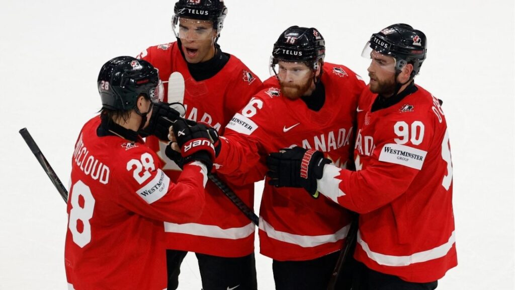 Ice Hockey - IIHF World Championships - Quarter Final - Canada v United States - BCF Arena, Fribourg, Switzerland - May 28, 2026 Canada's Connor Brown celebrates scoring their third goal with teammates REUTERS/David W Cerny