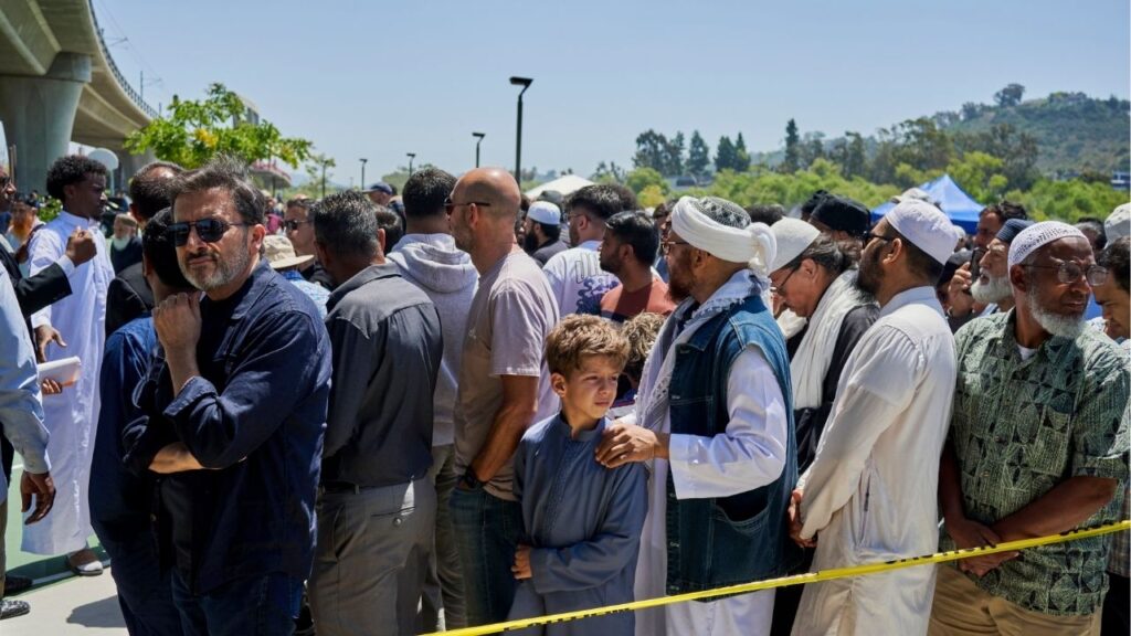 Mourners gather for a funeral prayer for three men who died on Monday while confronting two shooters at the Islamic Center of San Diego, in San Diego, on Thursday, May 21, 2026. The large showing was a sign of gratitude for the men, who lost their lives trying to stop the shooters. (John Francis Peters/The New York Times)