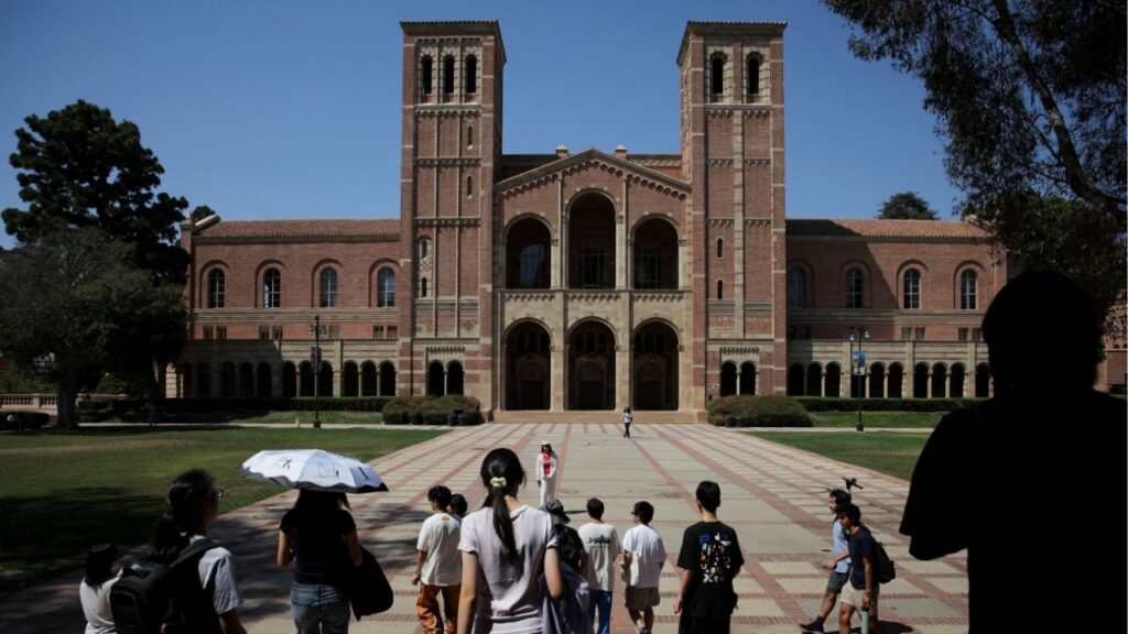 People walk through the campus of the University of California Los Angeles (UCLA) in Los Angeles, California, U.S., August 11, 2025. (Reuters/Daniel Cole)